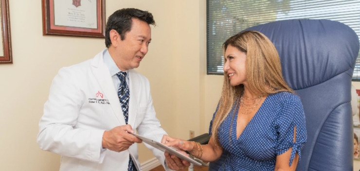 Dr. Steve Vu of Orange County Talking with Patient